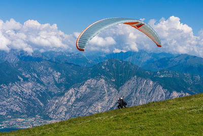 Paragliding from monte baldo over lake garda in italy.