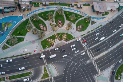  view of street intersection, cross walk markings, traffic signal lights, and curb cuts west bay doha