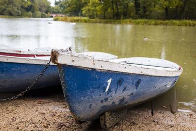 Boat moored on shore