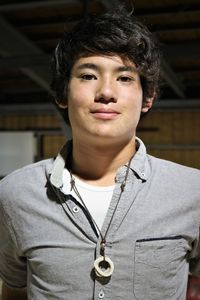 Portrait of young man standing outdoors