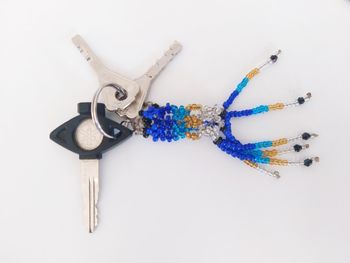 High angle view of equipment on table against white background