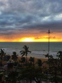 Scenic view of sea against sky at sunset