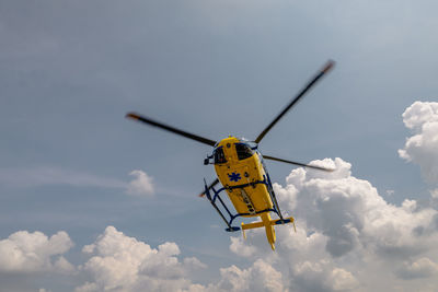 Low angle view of airplane against sky