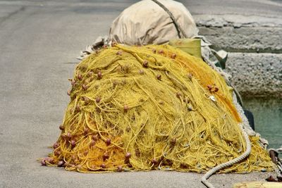 Close-up of fishing net on road