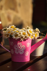 Close-up of flower vase on table