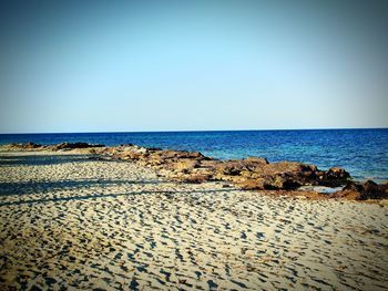 Scenic view of sea against clear sky