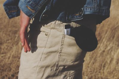 Close-up of woman standing in pond