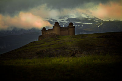 Low angle view of historic fort on mountain at la calahorra