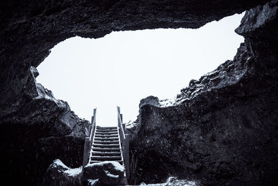 Low angle view of stairs against clear sky