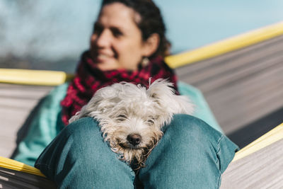 Portrait of woman with dog