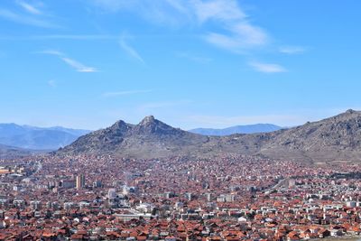 View of town against blue sky