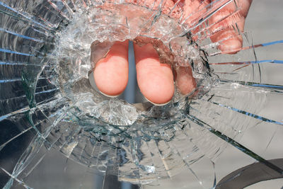 High angle view of broken glass in container