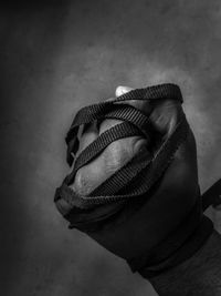 Midsection of person holding umbrella
