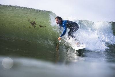Man surfing in rhode island summer