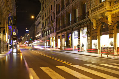 Light trails on city street at night