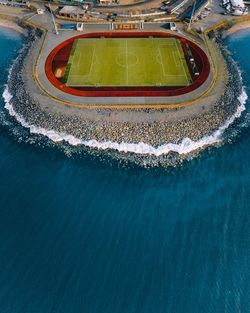 High angle view of pool by sea