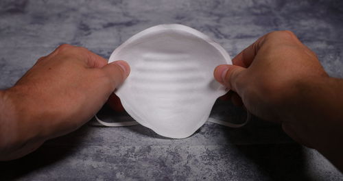 High angle view of man holding hands