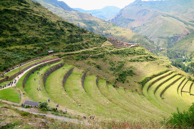 Ancient inca agricultural terraces at pisac archaeological site, sacred valley, cusco region, peru