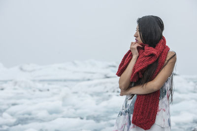 Beautiful woman posing for fashion photoshoot at glacierlagoon