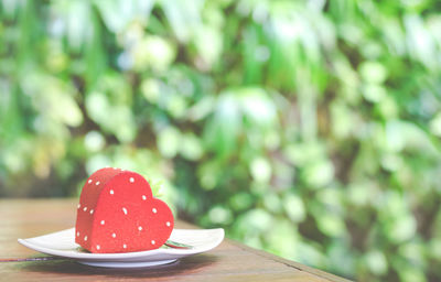 Close-up of red coffee in cup on table