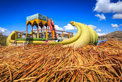 Boat made of totora, in the indigenous community of the uros in lake titicaca, peru.