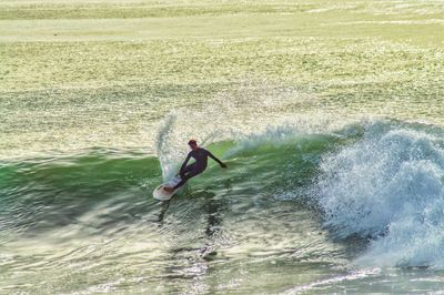 Man surfing in sea