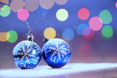 Close-up of multi colored lights on table