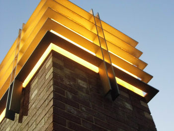 Low angle view of yellow office building