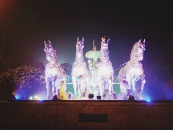 Close-up of illuminated statue at night