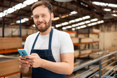 Young man using mobile phone