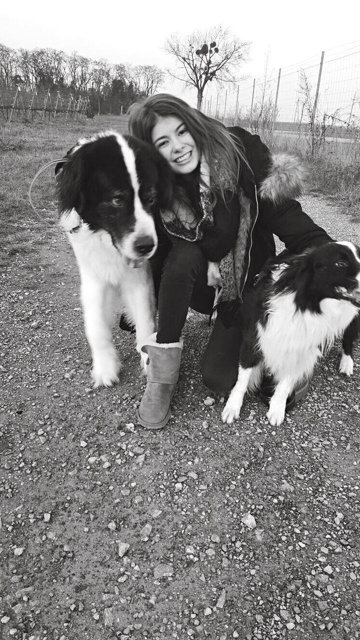 pets, domestic animals, dog, animal themes, mammal, friendship, animal, togetherness, portrait, happiness, outdoors, no people, cheerful, close-up, border collie, nature, day