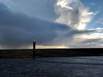 Scenic view of landscape against sky during winter