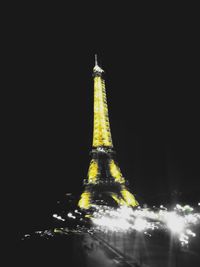 Low angle view of illuminated building at night