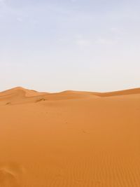 Scenic view of desert against sky