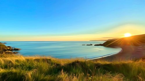 Scenic view of sea against sky during sunset