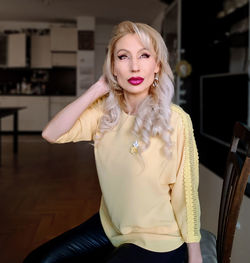 Portrait of beautiful woman at home