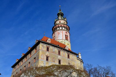 Low angle view of building against blue sky