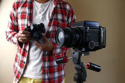 Man photographing with camera