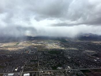 Aerial view of cityscape against sky