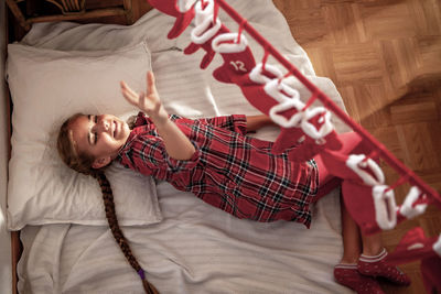 High angle view of young woman with dog