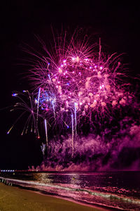 Firework display at night