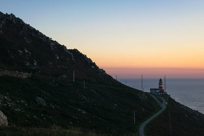 Cabo silleiro lighthouse located on a mountain next to the sea
