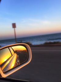 Scenic view of sea against sky at sunset