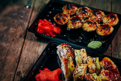 High angle view of meat on barbecue grill