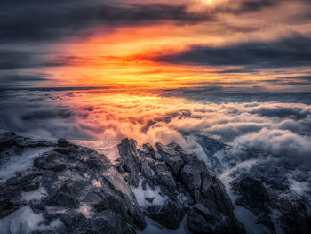 Scenic view of dramatic sky during sunset