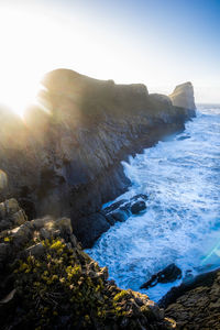 Gower peninsular, rugged seascape during sunset.