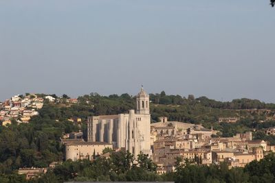 View of cityscape against clear sky