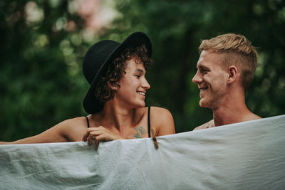 Portrait of smiling young man outdoors