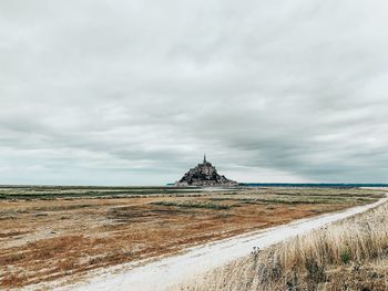 Scenic view of land against sky