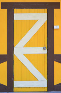 Full frame shot of yellow closed door